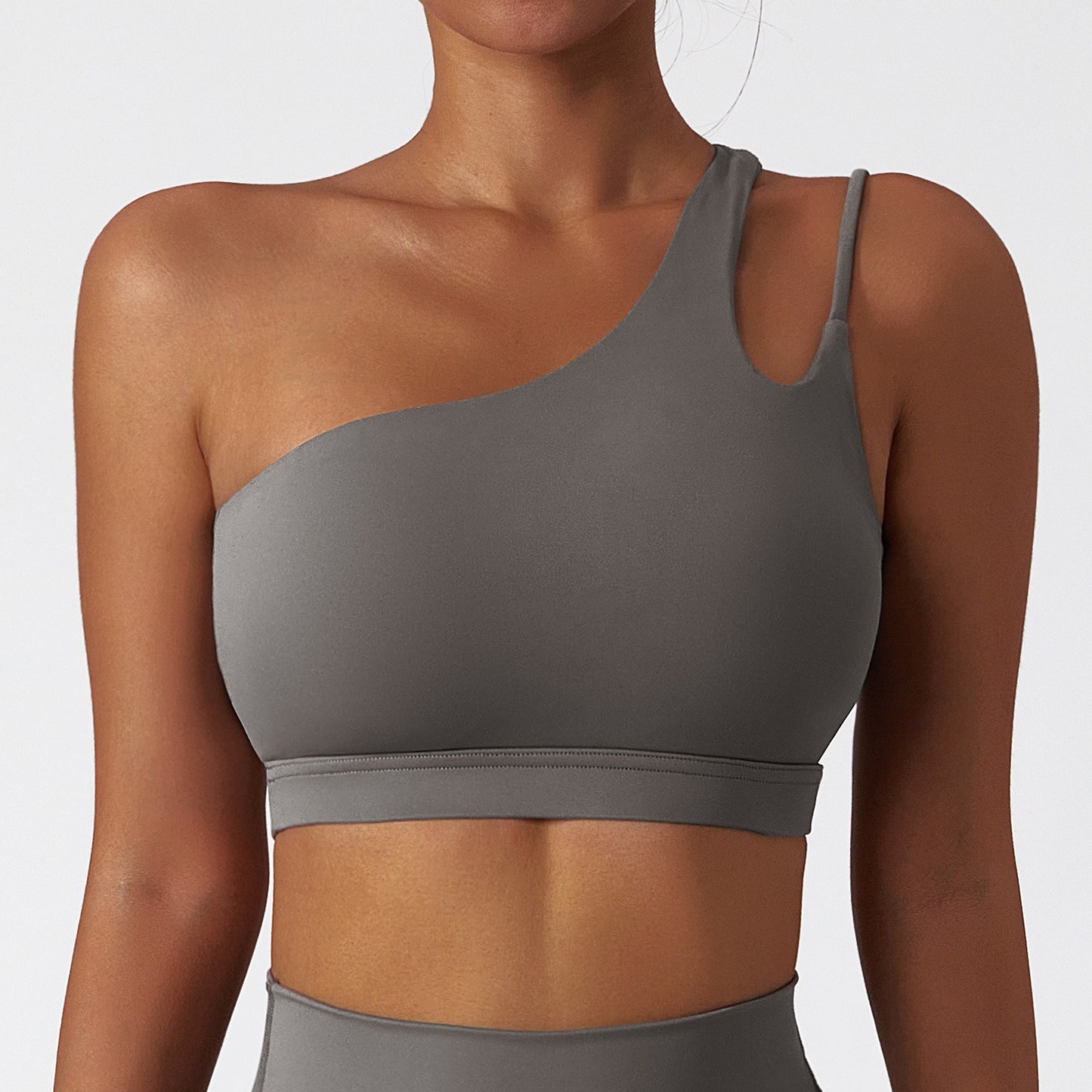 Oblique one-shoulder shock-proof yoga bra, cloud-like beautiful back sports bra, irregular shoulder straps, running fitness vest